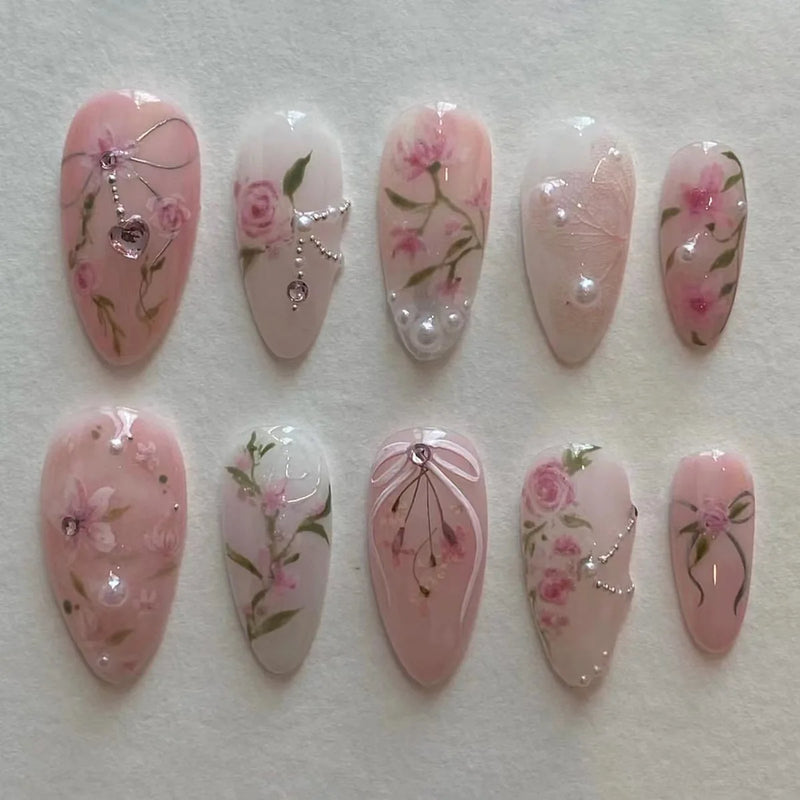 Unhas Postiças 24pcs Rosa Amêndoa com Laços, Corações e Pérolas – Press On Nail Estilo Coreano