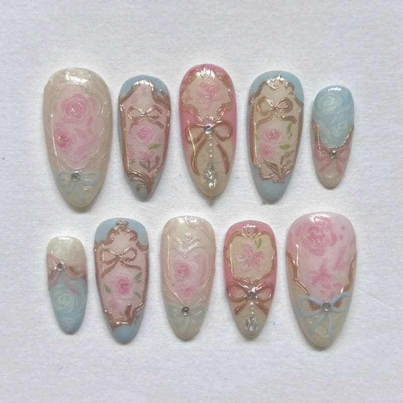 Unhas Postiças 24pcs Rosa Amêndoa com Laços, Corações e Pérolas – Press On Nail Estilo Coreano